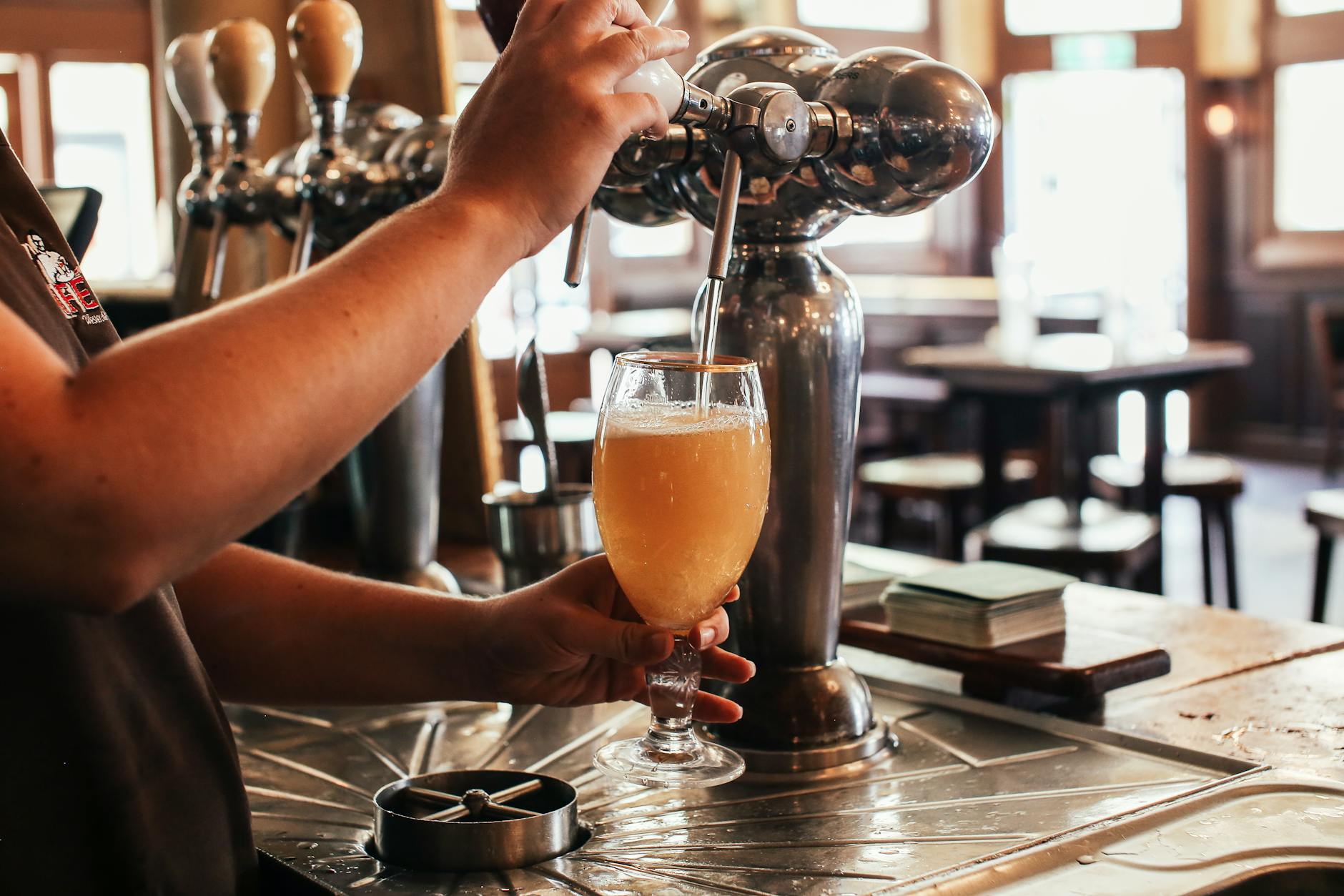 bartender pouring beer